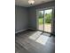 Dining room features sliding glass doors to deck and views of green space at 19236 Fox Chase Dr, Noblesville, IN 46062