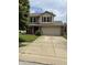 Charming two-story home featuring red shutters, a two car garage, and a concrete driveway at 19236 Fox Chase Dr, Noblesville, IN 46062
