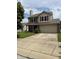 Charming two-story home featuring red shutters, a two car garage, and a concrete driveway at 19236 Fox Chase Dr, Noblesville, IN 46062