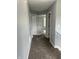 Hallway features a carpeted floor and doors leading to other rooms at 19236 Fox Chase Dr, Noblesville, IN 46062