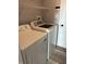 Bright laundry room equipped with modern washer and dryer units at 19236 Fox Chase Dr, Noblesville, IN 46062