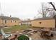 The backyard includes a fire pit and picnic table at 1940 N Drexel Ave, Indianapolis, IN 46218