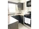 Functional kitchen features stainless steel appliances and ample counter space at 1940 N Drexel Ave, Indianapolis, IN 46218