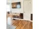 Hardwood floors and stylish decor in a comfortable living area near a bright window at 1940 N Drexel Ave, Indianapolis, IN 46218