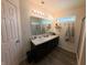 Bathroom featuring a dual sink vanity, and modern fixtures, creating a spa-like atmosphere at 1980 Bridlewood Dr, Franklin, IN 46131