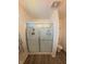 Modern bathroom featuring a tiled shower with glass doors and neutral decor, enhanced by natural light at 1980 Bridlewood Dr, Franklin, IN 46131