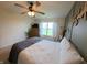 Well-designed bedroom featuring a cozy bed, accent wall, and plenty of natural light at 1980 Bridlewood Dr, Franklin, IN 46131