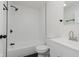 Modern bathroom features a shower-tub, white subway tile, and updated fixtures at 20797 Roberts Dr, Sheridan, IN 46069