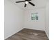 A well-lit bedroom with wood-look flooring and natural light at 20797 Roberts Dr, Sheridan, IN 46069