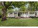Charming single-story home featuring a well-manicured lawn and inviting front entrance with a stately tree at 20797 Roberts Dr, Sheridan, IN 46069