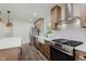 Beautiful kitchen featuring stainless steel appliances, sleek countertops, and modern fixtures at 20797 Roberts Dr, Sheridan, IN 46069