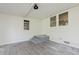 Bright room with neutral walls, sleek flooring, and natural light streaming in from the windows at 20797 Roberts Dr, Sheridan, IN 46069