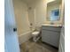 Clean bathroom showcasing a bathtub, toilet, vanity, and ample lighting creating a welcoming space at 2954 Grand Rdg Dr, Greenwood, IN 46143