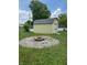The backyard has a shed and a fire pit at 3038 S Richardt Ave, Indianapolis, IN 46239