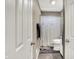 A bathroom with a shower and toilet at 3038 S Richardt Ave, Indianapolis, IN 46239