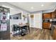 Kitchen and dining area featuring vinyl floors and neutral gray walls at 3038 S Richardt Ave, Indianapolis, IN 46239