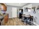 Eat in kitchen with wood floors, gray walls and stainless steel appliances at 3038 S Richardt Ave, Indianapolis, IN 46239