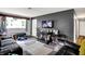 Cozy living room features vinyl floors, neutral walls, and comfortable seating at 3038 S Richardt Ave, Indianapolis, IN 46239