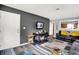 Living room featuring vinyl floors, neutral walls, and ample natural light at 3038 S Richardt Ave, Indianapolis, IN 46239