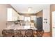 Beautiful kitchen with stainless steel appliances, granite countertops, and breakfast bar seating at 3147 Bonham Dr, Indianapolis, IN 46222