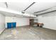 Spacious garage with open ceiling showing mechanics, concrete floors, and room for storage at 317 Heritage Ct, Fishers, IN 46038