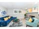 Finished basement living area features a fireplace, contemporary decor and light gray flooring at 317 Heritage Ct, Fishers, IN 46038