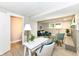 Bright living room with updated decor featuring modern lighting, accent furniture, and painted brick fireplace at 317 Heritage Ct, Fishers, IN 46038