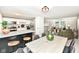Inviting living space with a dining table, kitchen island with granite counter, and a cozy living area at 317 Heritage Ct, Fishers, IN 46038