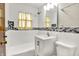 Bathroom with tile and white fixtures and a vanity at 3322 N Riley N Ave, Indianapolis, IN 46218