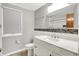 Renovated bathroom featuring new vanity and contemporary fixtures at 3322 N Riley N Ave, Indianapolis, IN 46218