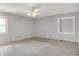 Comfortable bedroom with a ceiling fan and built-in shelving at 3322 N Riley N Ave, Indianapolis, IN 46218