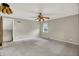 This is a gray bedroom with carpet and one window at 3322 N Riley N Ave, Indianapolis, IN 46218