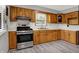 Well-equipped kitchen featuring stainless steel appliances and plenty of counter space at 3322 N Riley N Ave, Indianapolis, IN 46218