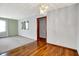 Inviting living space with hardwood floors, plush carpet, neutral walls and natural light enhancing its appeal at 3322 N Riley N Ave, Indianapolis, IN 46218