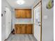 Functional mud room with built-in cabinets and convenient access to the outside at 3322 N Riley N Ave, Indianapolis, IN 46218