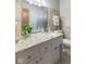 Bathroom with granite vanity and neutral tile, offering a clean and elegant design at 3388 S Leonard Rd, New Palestine, IN 46163