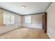 Carpeted bedroom with wallpaper, white trim and two windows at 3388 S Leonard Rd, New Palestine, IN 46163