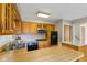 Kitchen featuring wooden cabinets and stainless steel appliances with ample counter space at 3388 S Leonard Rd, New Palestine, IN 46163