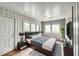 A comfortable bedroom with multiple windows for plenty of natural light at 4034 N Temple Ave, Indianapolis, IN 46205