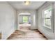 Bright living room featuring a large window for plenty of natural light at 4034 N Temple Ave, Indianapolis, IN 46205