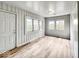 Inviting living room featuring multiple windows for plenty of natural light at 4034 N Temple Ave, Indianapolis, IN 46205