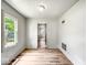 Living room featuring a large window for plenty of natural light at 4034 N Temple Ave, Indianapolis, IN 46205