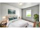 Staged primary bedroom with a comfortable bed, modern decor, and a calming ambiance at 4034 N Temple Ave, Indianapolis, IN 46205