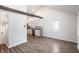 Open-concept living area with hardwood floors, modern kitchen, and a comfortable atmosphere at 4245 Norwaldo Ave, Indianapolis, IN 46205