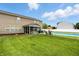 This property boasts a spacious backyard with a screened-in porch and an in-ground pool at 5063 Haywood Ln, Plainfield, IN 46168