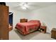 Spacious bedroom featuring neutral walls, ceiling fan and carpet at 5063 Haywood Ln, Plainfield, IN 46168