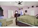 Airy main bedroom featuring vaulted ceilings, neutral decor, and an en-suite bathroom at 5063 Haywood Ln, Plainfield, IN 46168