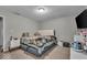Comfortable bedroom with a plush bed, neutral tones, and a full dresser at 5201 Gringo Dr, Indianapolis, IN 46237