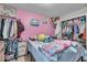 Bedroom featuring playful decor and lots of natural light at 5201 Gringo Dr, Indianapolis, IN 46237