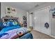 Bedroom with a Minecraft theme and plush blue carpet at 5201 Gringo Dr, Indianapolis, IN 46237